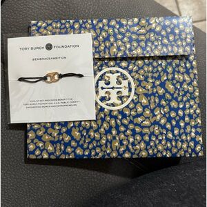 Brand new Tory Burch Black and Gold Bracelet
